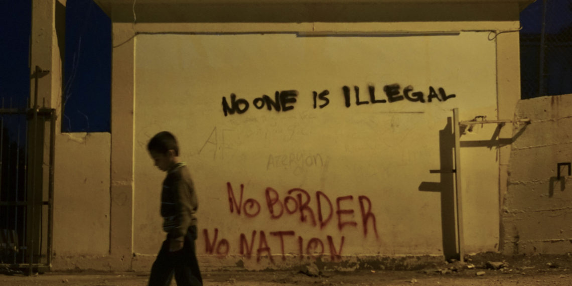 Underaged refugee in a camp located at the northeastern Greek island of Lesbos,  30 January 2016.