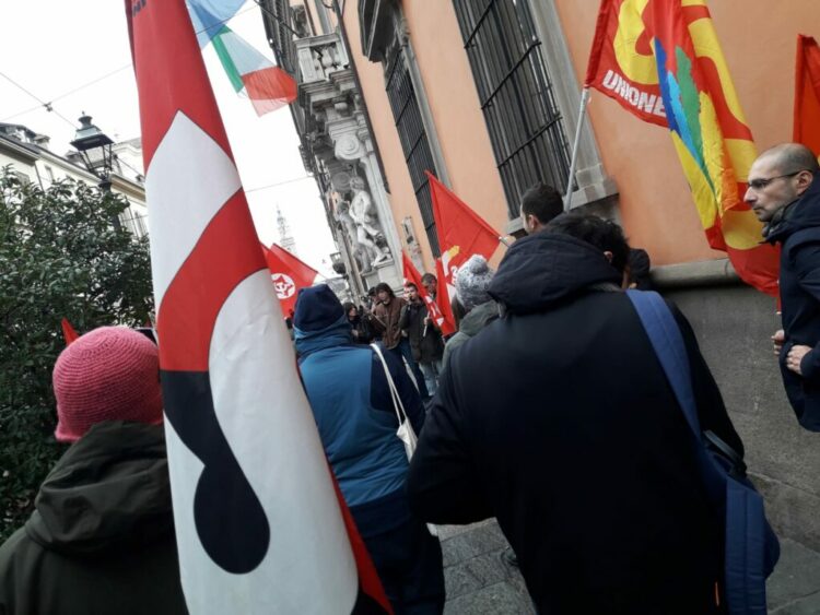[Italy] Guns down wages up · General strike