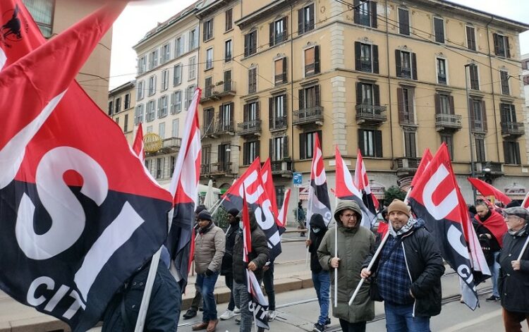 [Italy] Guns down wages up · General strike