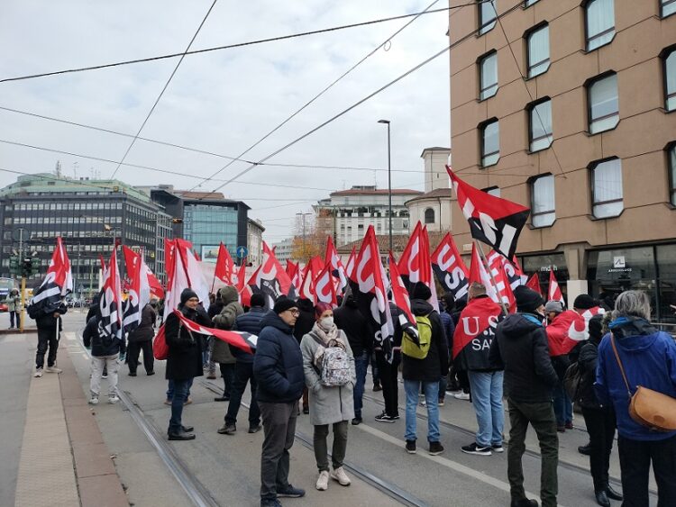 [Italy] Guns down wages up · General strike