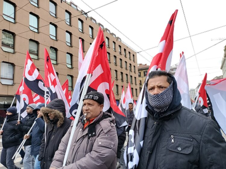 [Italy] Guns down wages up · General strike