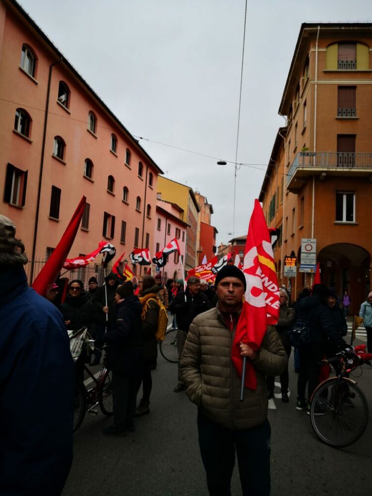 [Italy] Guns down wages up · General strike