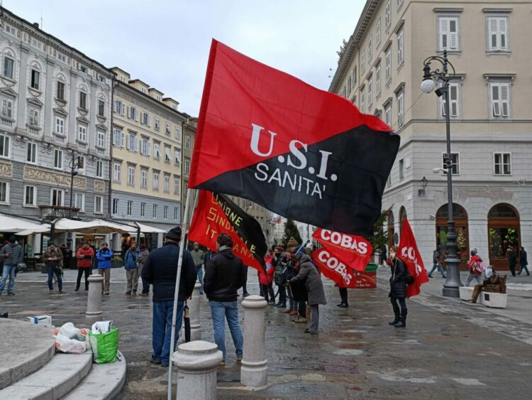 [Italy] Guns down wages up · General strike